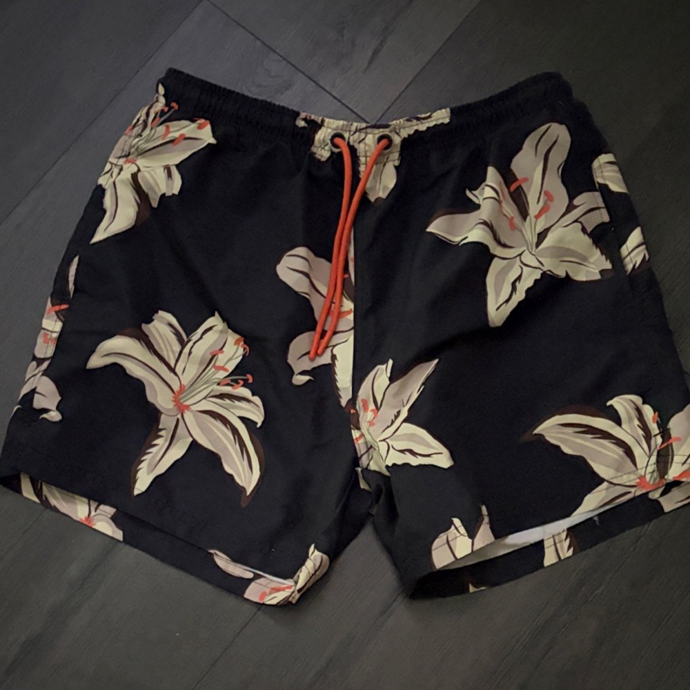 Primark Black Swim Shorts with Cream Lily Print and Orange Accents